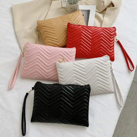 Clutch | Rillet udtryk | Perfekt til hverdagen - Til kvinder