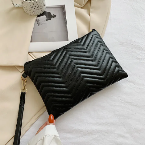 Clutch | Rillet udtryk | Perfekt til hverdagen - Til kvinder