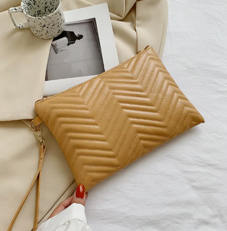 Clutch | Rillet udtryk | Perfekt til hverdagen - Til kvinder