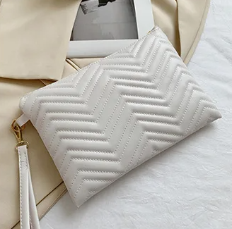 Clutch | Rillet udtryk | Perfekt til hverdagen - Til kvinder